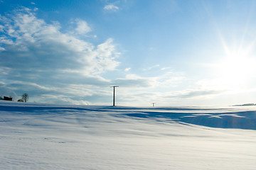 Image showing beautiful sunny landscape in winter with blue sky