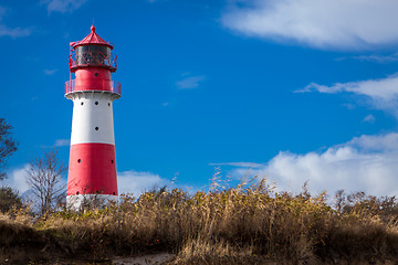 Image showing landscape baltic sea dunes lighthouse in red and white 