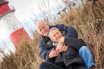 Image showing happy mature couple relaxing baltic sea dunes 