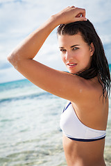 Image showing beautiful young brunette woman in bikini sea ocean 