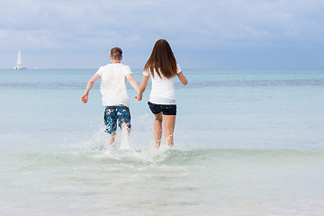 Image showing young happy couple in summer holiday vacation summertime