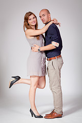 Image showing young attractive couple in love embracing portrait