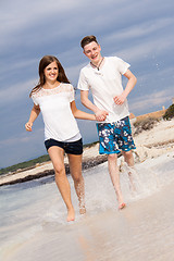 Image showing happy young couple on the beach in summer holiday love