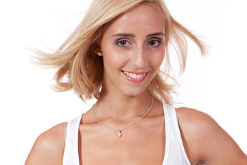 Image showing attractive young smiling blonde woman isolated