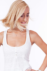 Image showing attractive young smiling blonde woman isolated