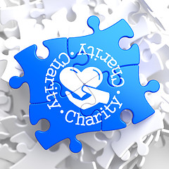 Image showing Charity Concept on Blue Puzzle.