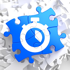Image showing Stopwatch Icon on Blue Puzzle.