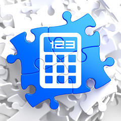 Image showing Calculator Icon on Blue Puzzle.