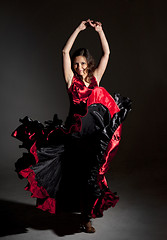 Image showing Young woman dancing flamenco