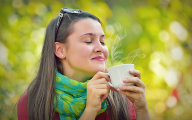 Image showing Beautiful Girl enjoy a coffee in Nature