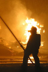 Image showing firefighter in silhouette