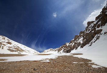 Image showing Snowy rocks and blue sky