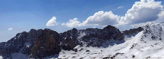 Image showing Panorama of snowy mountains in spring sunny day