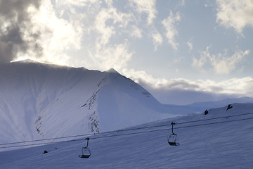 Image showing Ski slope and chair-lift in evening