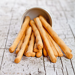 Image showing cup with bread sticks grissini