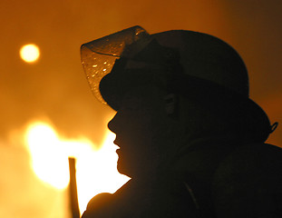 Image showing fireman in silhouette