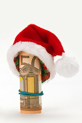 Image showing Santa hat with fifty euro banknote