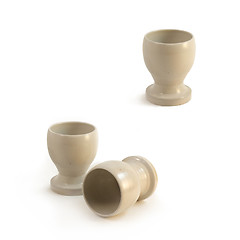 Image showing Dirty white handmade ceramic goblet stands