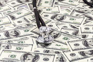 Image showing Stethoscope on dollars