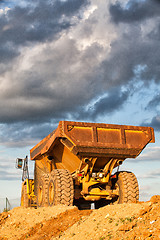 Image showing Heavy mining truck at sunset