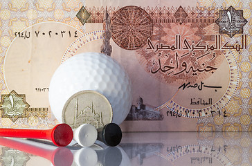 Image showing Egyptian money and golf equipments