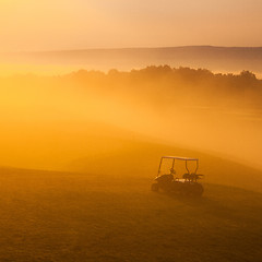 Image showing Green golf cart on the empty golf course