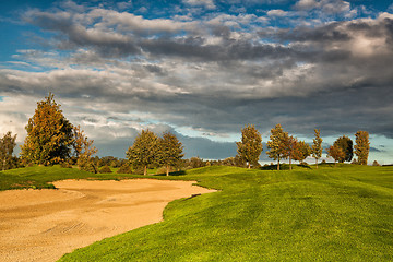 Image showing Summer golf course at sunset