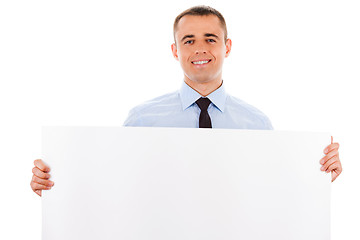 Image showing businessman holding white placard