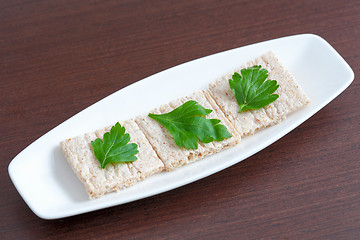 Image showing Diet bread with parsley on a plate