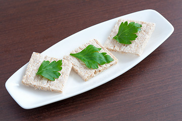 Image showing Diet bread with parsley on a plate