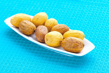 Image showing large nuts on a plate