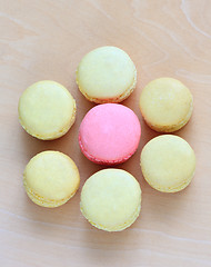 Image showing Colorful macaroons on wooden background