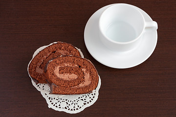 Image showing Chocolate sacher cake on wooden table