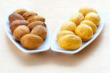 Image showing two plates with large nuts