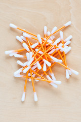 Image showing Ear sticks scattered on a table