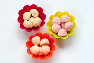 Image showing sweet jelly candies in cup cake cases on white