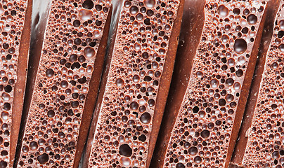 Image showing Aerated porous chocolate as a background