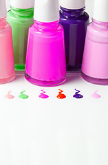 Image showing Bottles with spilled nail polish