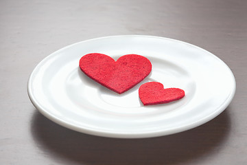 Image showing Red hearts on a plate