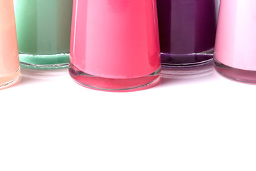 Image showing Bottles with spilled nail polish