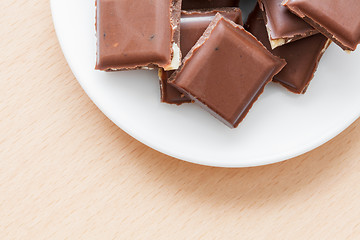 Image showing chocolate with nuts on a plate