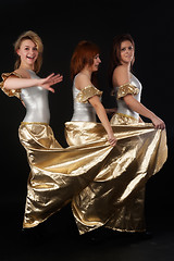 Image showing Three pretty girls dancing