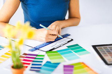 Image showing woman working with color samples for selection