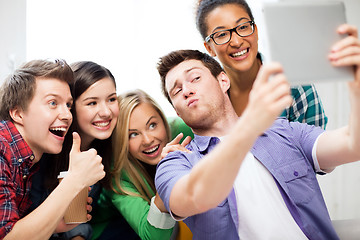 Image showing students making picture with tablet pc at school