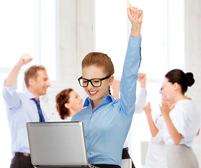 Image showing businesswoman with computer in office