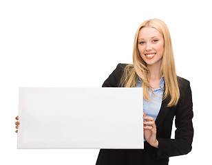 Image showing businesswoman with white blank board