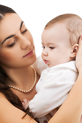 Image showing happy mother with adorable baby