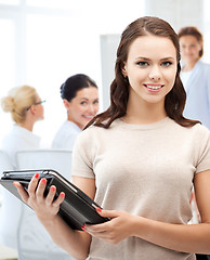 Image showing businesswoman with tablet pc in office