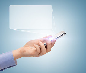 Image showing man hand with smartphone and virtual screen