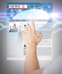 Image showing man with virtual screen and news